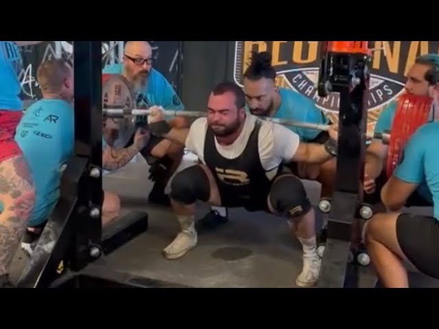 A lifter performing a max effort squat in Bar Physical Therapy's gym in Ahwatukee.
